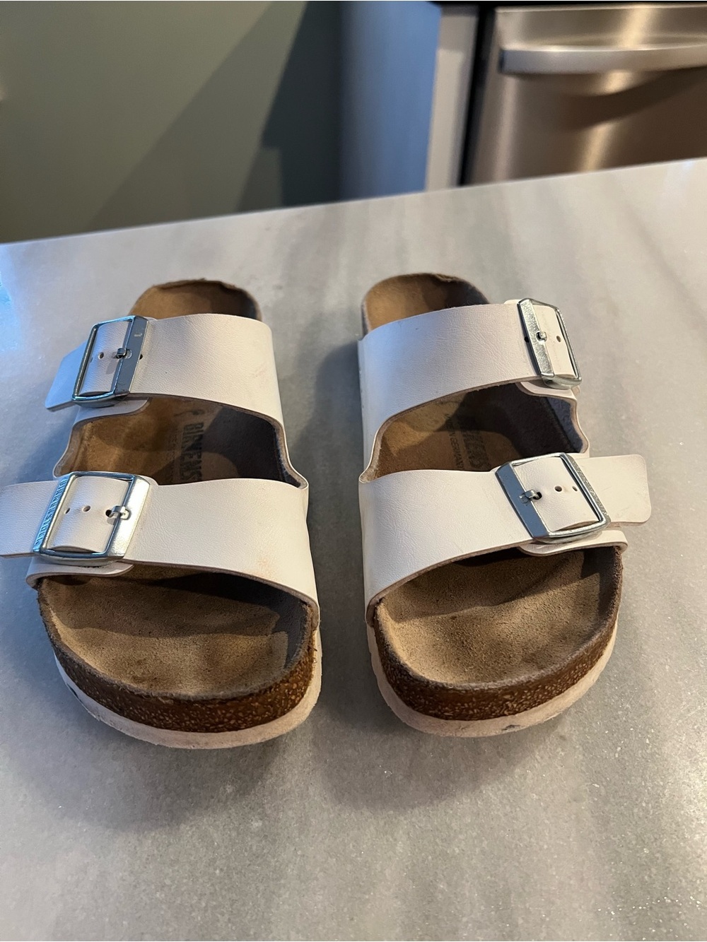 Birkenstock White Slide Sandal with Black Logo